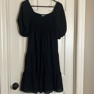 Nanette Lepore black casual dress. Size 6. Tiered skirt. Ruched bodice. Black